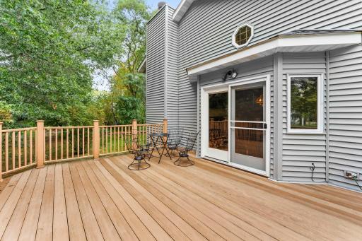 Well maintained deck retreat easily accessible form the main level and offers a private setting.