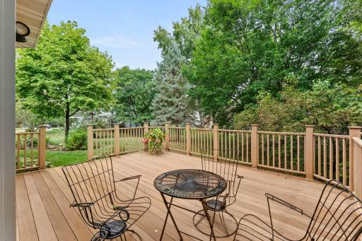 Beautiful mature trees! Well maintained deck is ready for entertaining or relaxing BBQ's at home.