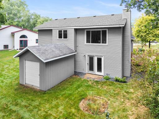 Convenient walkout basement! A storage shed provides additional space for lawn equipment, bikes, and outdoor gear.