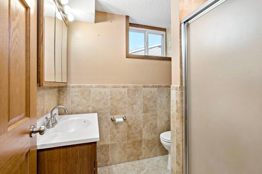 The lower-level 3/4 bath is handy for guests.