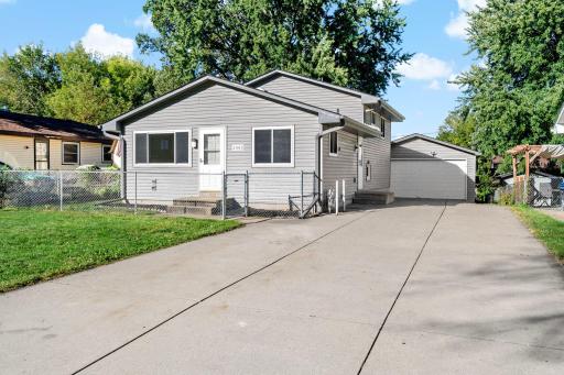 The long driveway offers plenty of room to park and leads right to the garage.