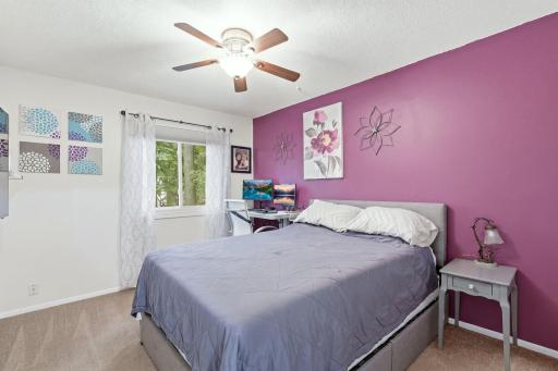 Spacious room, ceiling fan, and nice view.