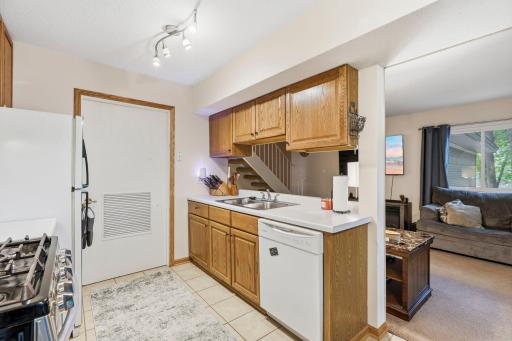 Opening to living room and extra windows make this end unit stand out.