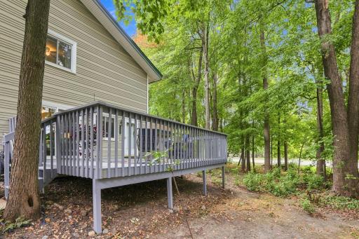 Deck is huge and conveniently connected via front door and newer patio door.