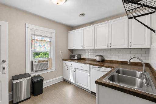 Beautiful updated kitchen in this large two story unit.