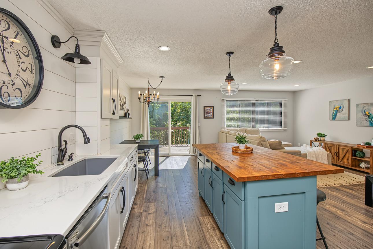 Butcher block island is a gorgeous accent piece and perfect prep space.