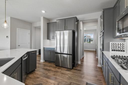 Wonderful space for a coffee bar next to refrigerator.