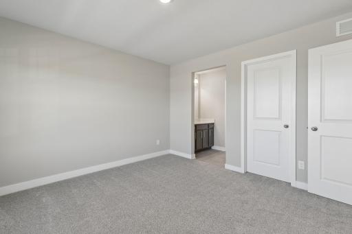 Upper bedroom #3 with walk-in closet. Access to Jack and Jill bathroom.