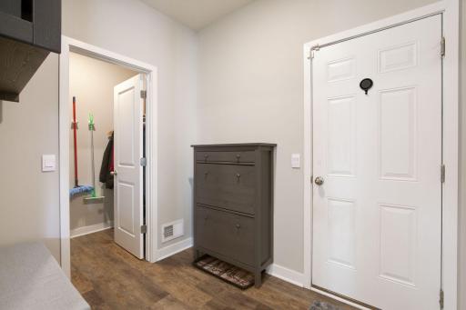 Main level garage entrance with walk-in closet/pantry.