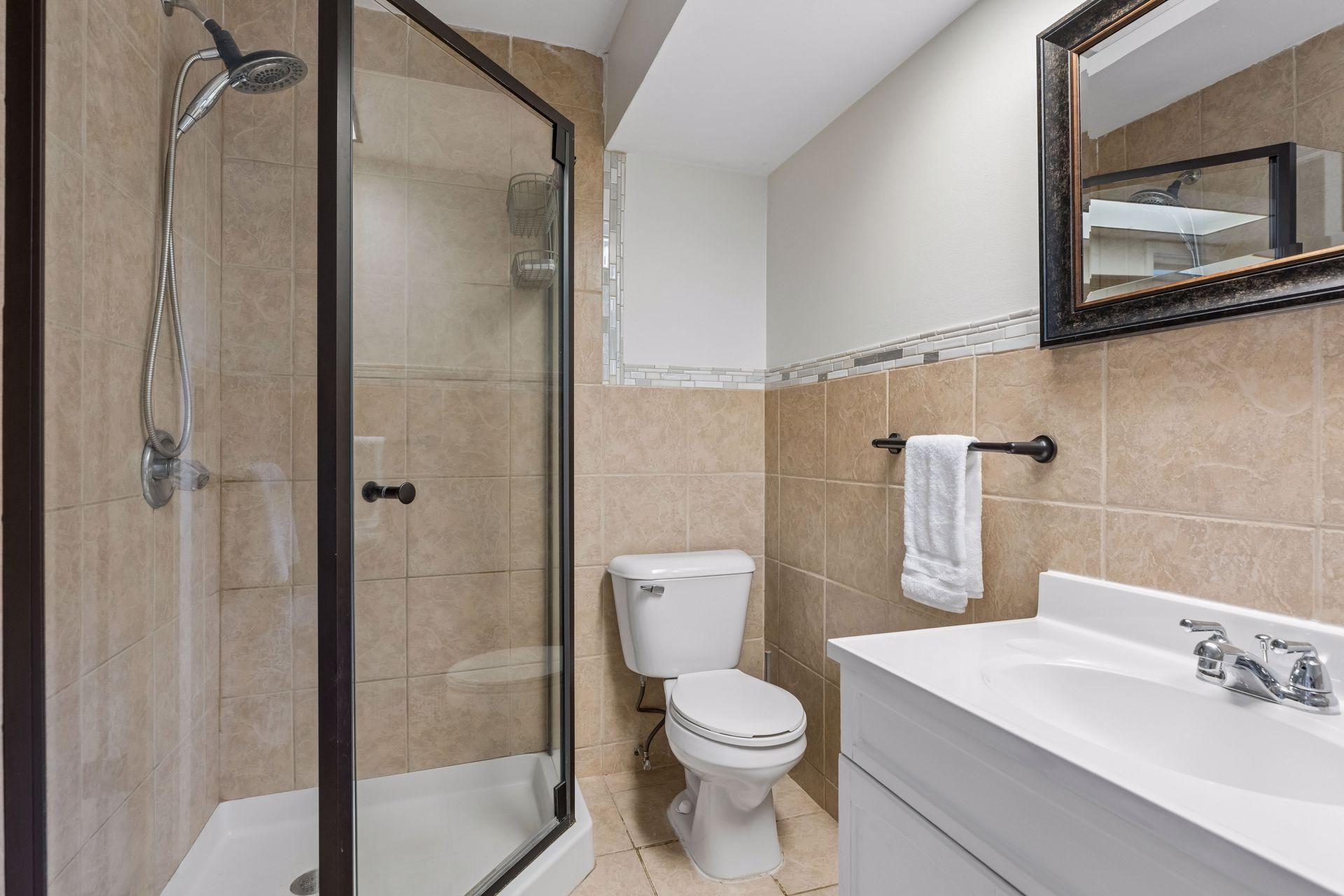 3/4 bath on main level, across hall from second bedroom/office
