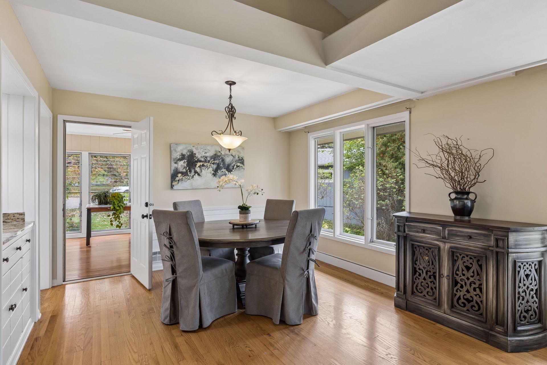 Formal dining room adjacent to 3-season sun room