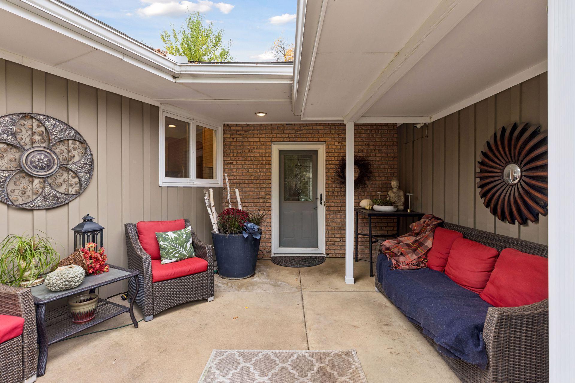 Charming front patio warmly welcomes guests