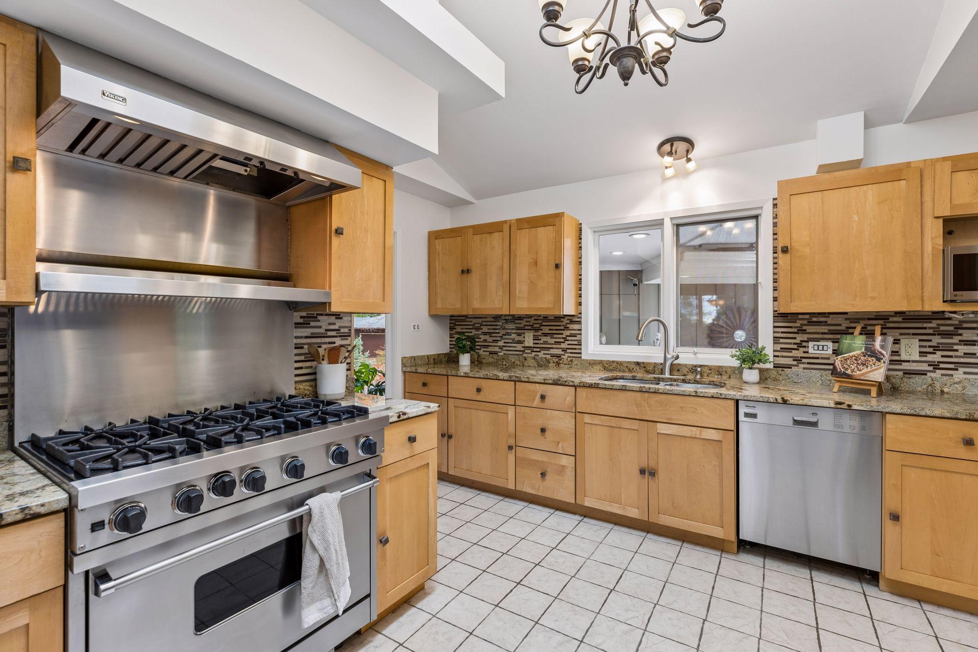 The kitchen is a chef's dream with high end stainless appliances