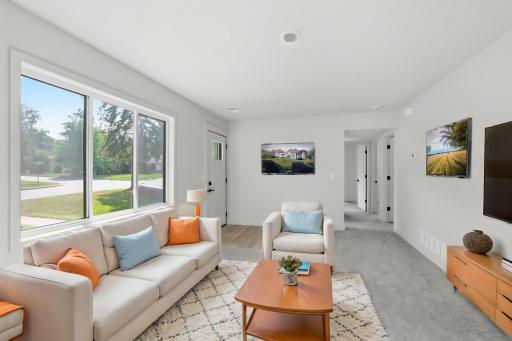 Walk right into your sunny and bright living room! This room is virtually staged.