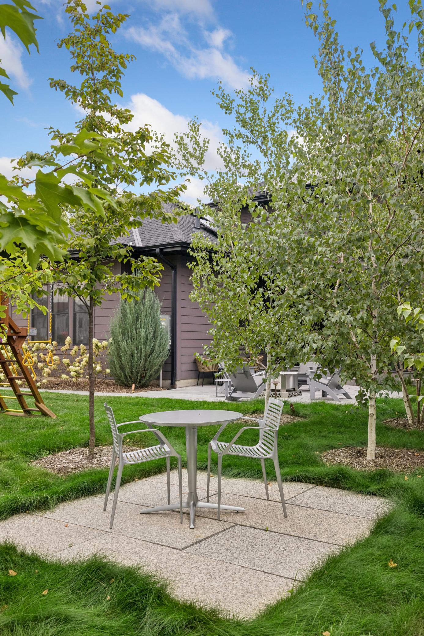 Tucked into the corner of the lot, a second private patio offers another quiet place to enjoy the outdoors.