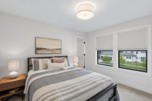 Inviting fourth bedroom with private 3/4 bath.