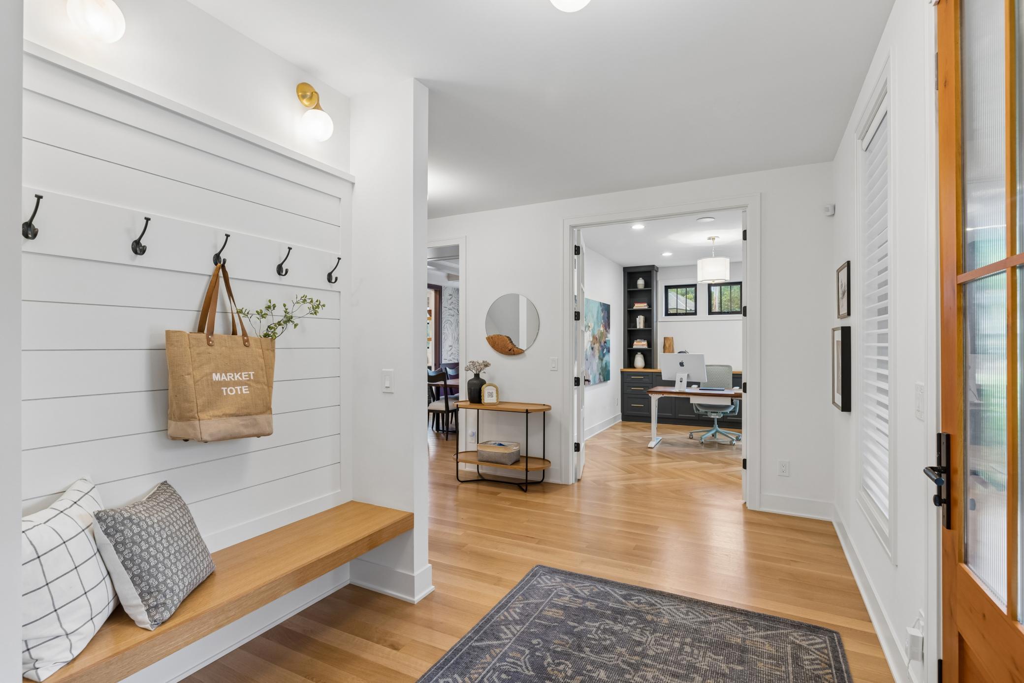 Inviting front foyer with built-in seating.