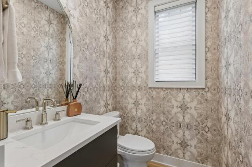 Beautifully finished main-level half bath.