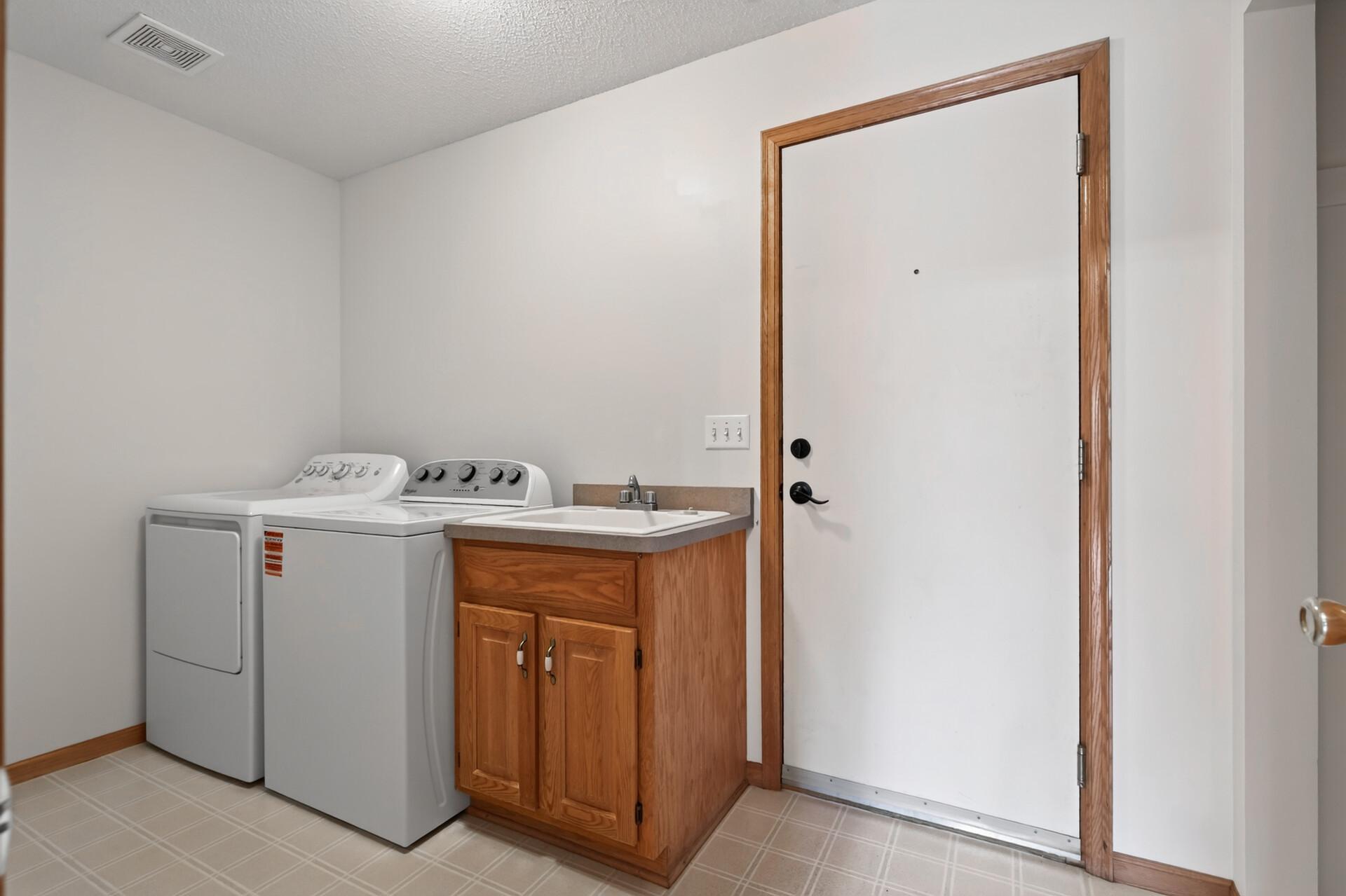Functional Mudroom & Laundry Space!