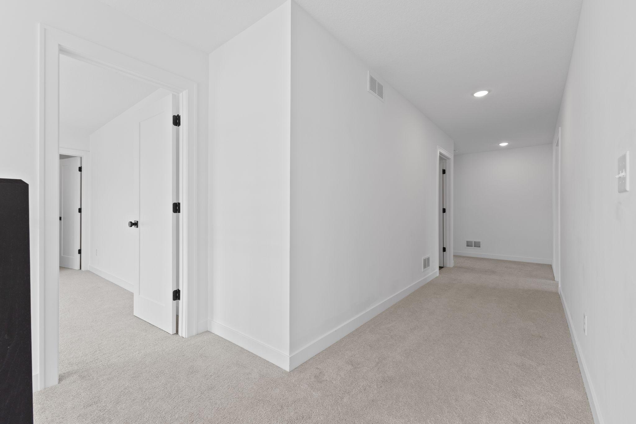 The upper level offers four bedrooms, multiple bathrooms and convenient laundry all on one floor.