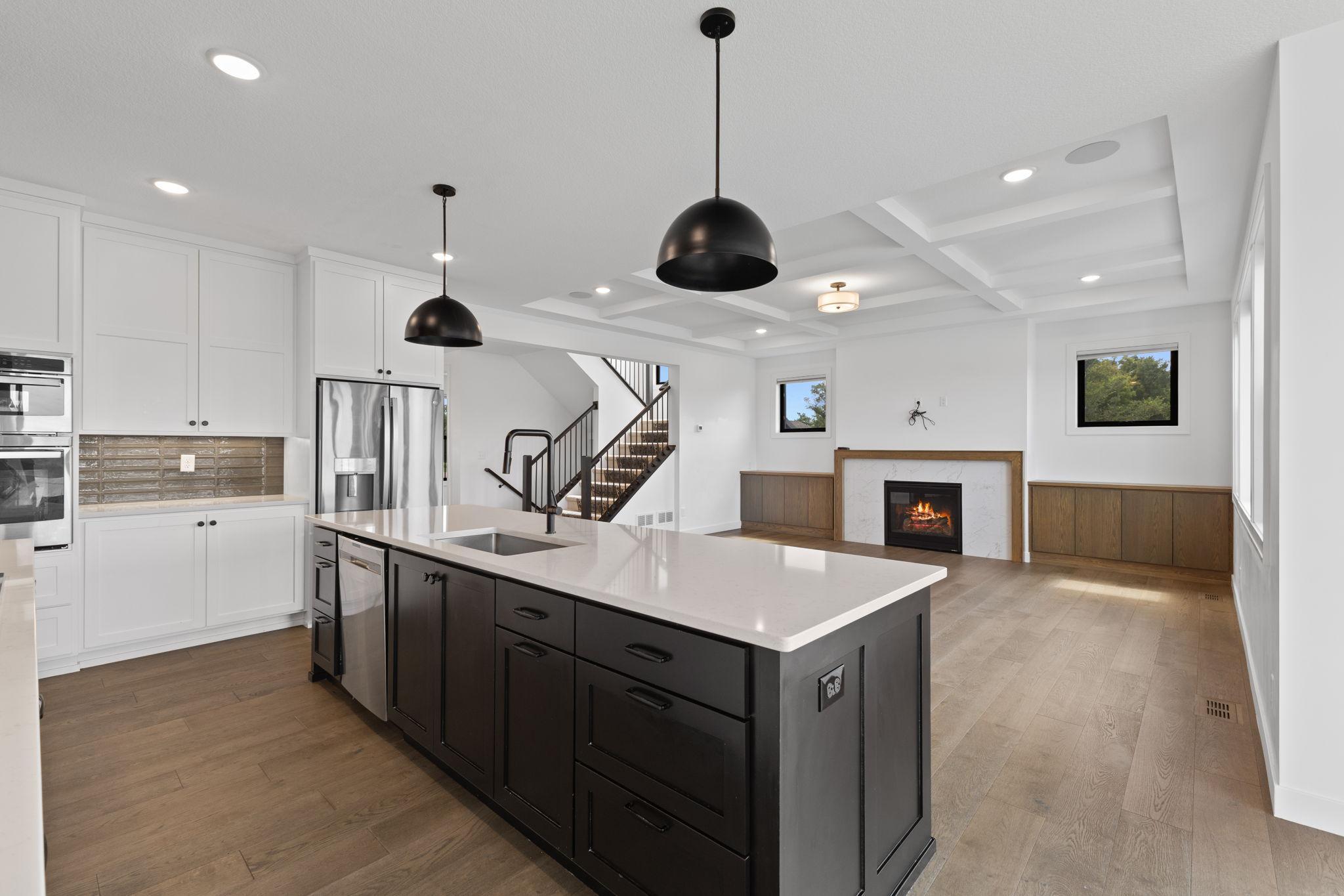 The kitchen opens directly to the living room, making everyday living and entertaining effortless.