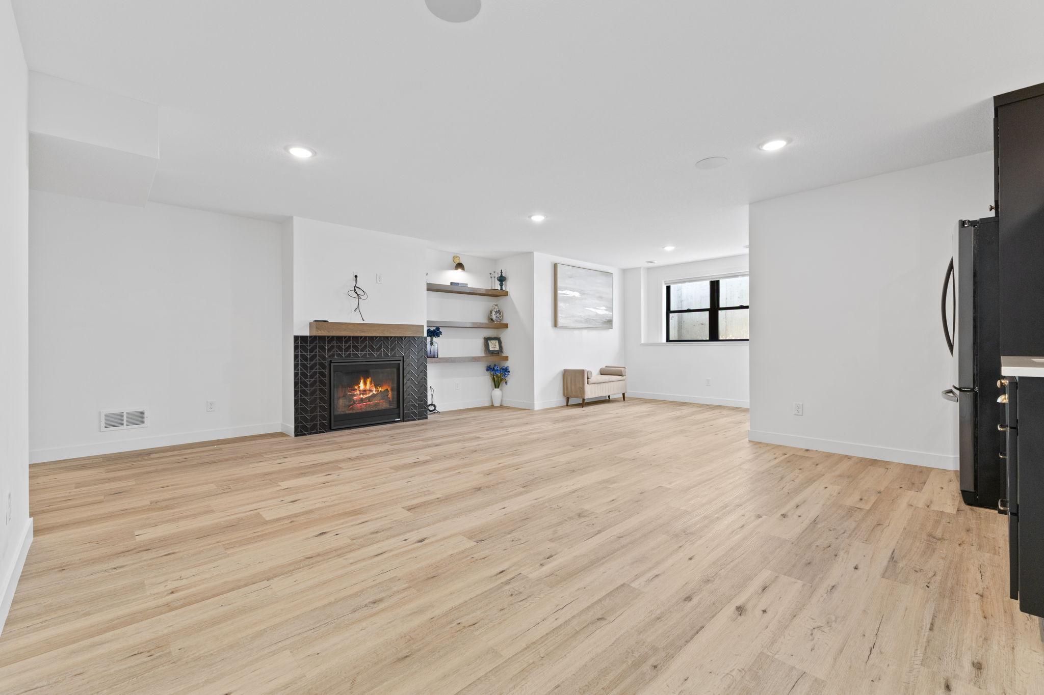 A second fireplace adds warmth and character to the lower-level.