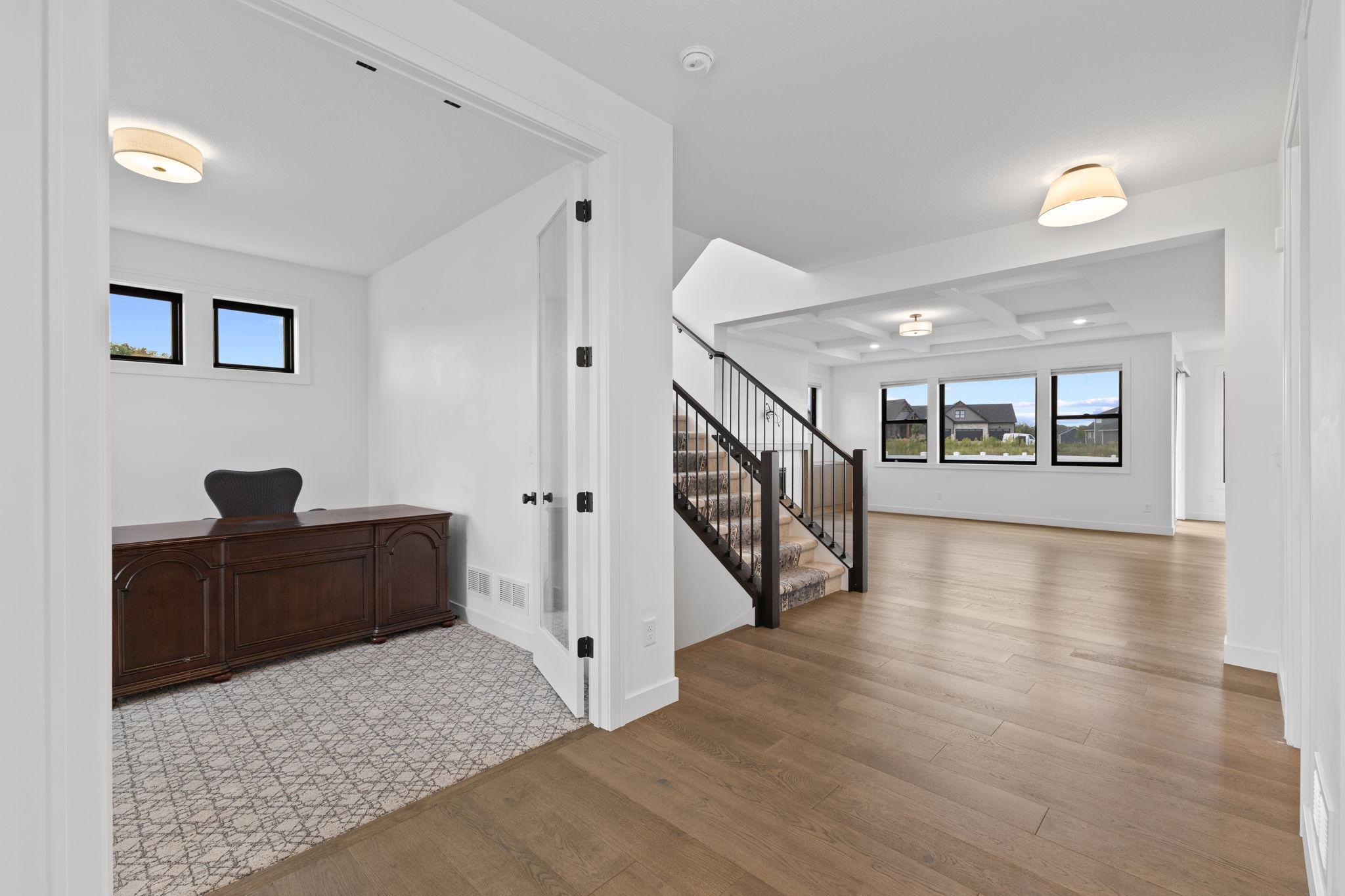 A flexible main-level office offers the perfect space for working from home, studying, or tackling everyday tasks.