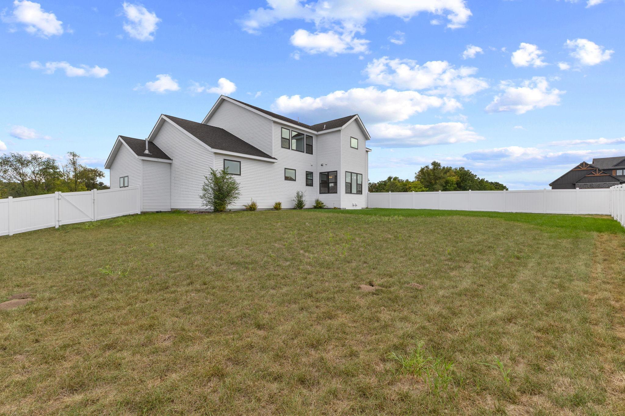 Step outside to a generous backyard with plenty of room for outdoor activities and gatherings.