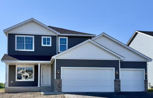 Photo for 3135 Jandura Avenue NE, Saint Michael, MN 55376 - listing #7138097 3135 Jandura Ave NE - New Construction Home ready for a September Move-in! Highlights include a 4 Bay Garage located on a Walkout Homesite! Sod, Irrigation System, & Front Plantings included and will be installed soon.
