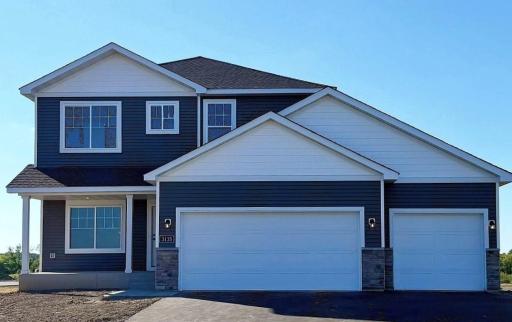 3135 Jandura Ave NE- New Construction Home ready for a Quick Move-in! Highlights include a 4 BAY GARAGE and Front Porch located on a WALKOUT HOMESITE! Sod, Irrigation System, & Front Plantings will be installed soon.
