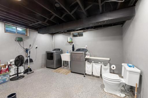 Lower level laundry with the a half bath
