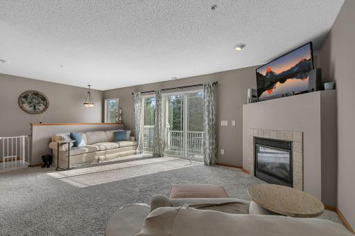 Enjoy The Warmth Of The Fireplace In This Beautiful, Spacious Living Area With Great Front Yard Views!