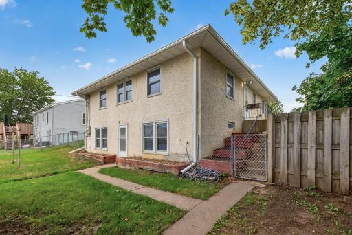 Backyard is flat and fenced. Perfect for a pet.