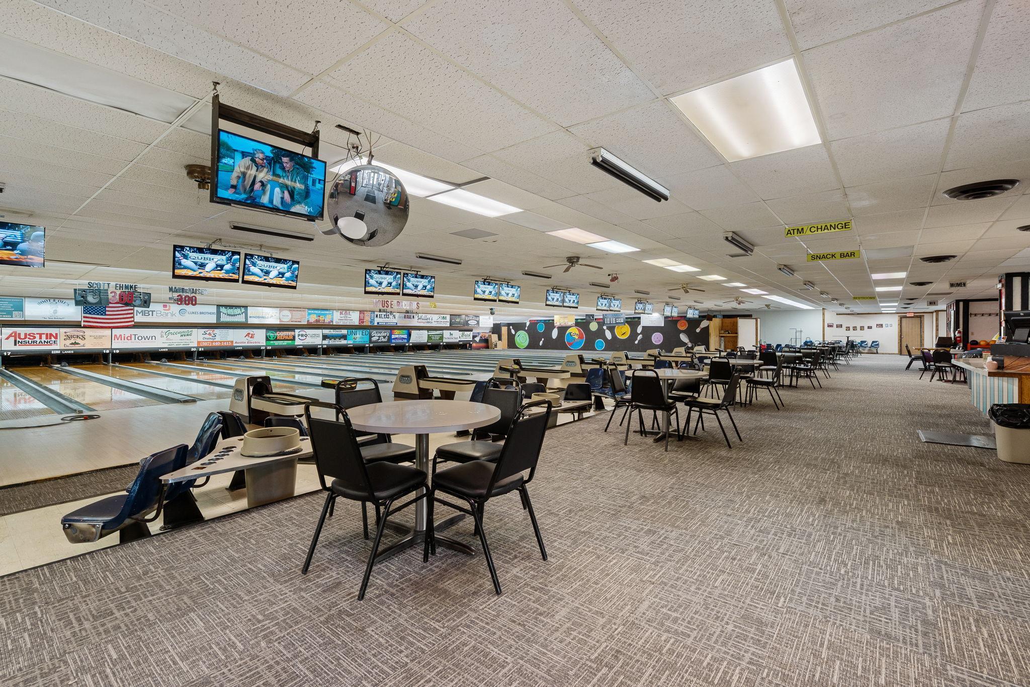 Spectator area with tables and chairs