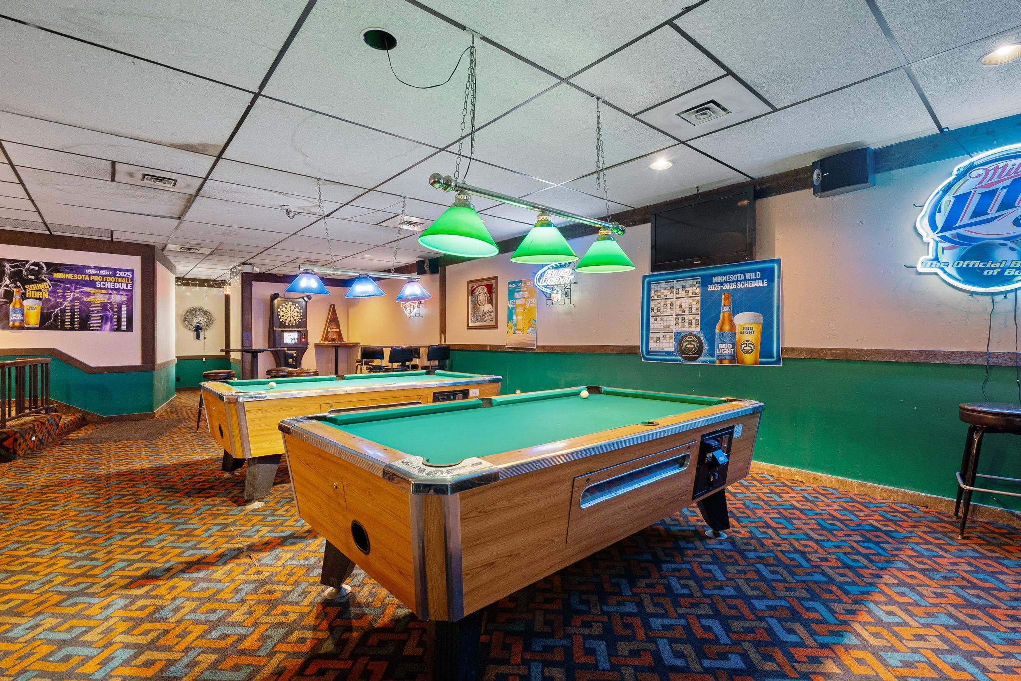 2 pool tables in bar