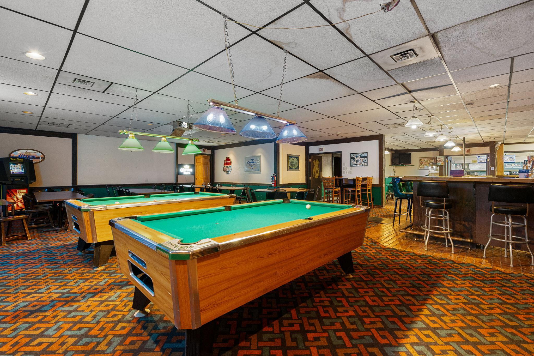 2 pool tables in bar