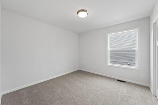 A different angle of the first bedroom.