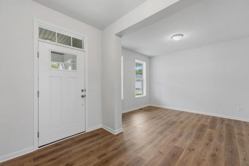 Thoughtfully designed foyer showcasing modern finishes, durable flooring, and a layout that seamlessly connects to the main living areas.