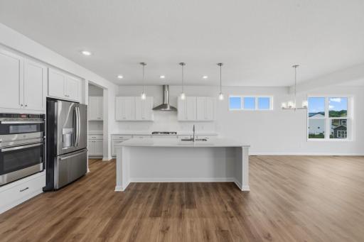 The spacious gourmet kitchen is the centerpiece of this home. Perfect for the gourmet chef or the entertainer!