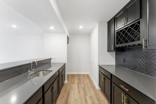 This wet bar area is a must for all your entertaining!