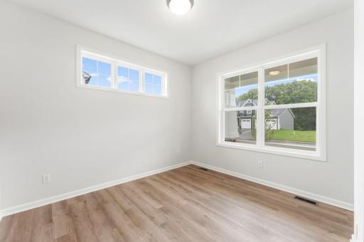 Ton of natural light in the flex room, making the space bright and inviting.