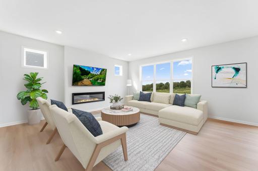 For representational purposes only. Another view of the family room, this space is perfect for hosting and entertaining but also a cozy space to enjoy a movie night by the fireplace. (model photo)