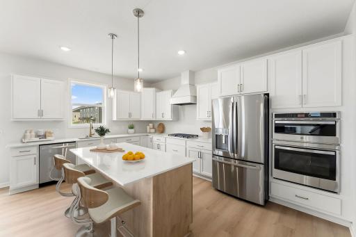 For representational purposes only. The gourmet kitchen is the centerpiece of this home. Perfect for the gourmet chef or the entertainer! (model photo)