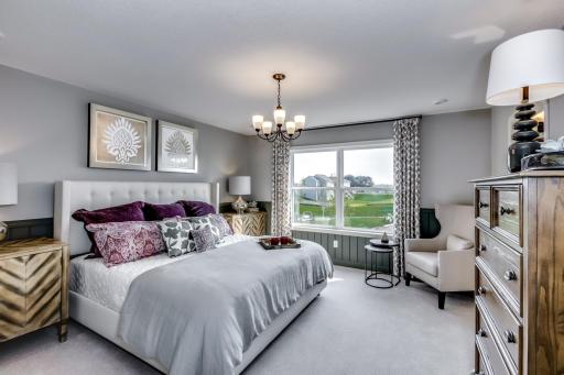 The expansive owner's suite is the perfect get away to recharge, relax and renew. The owner's suite even provides space for a sunny and comfortable sitting area. (model photo)