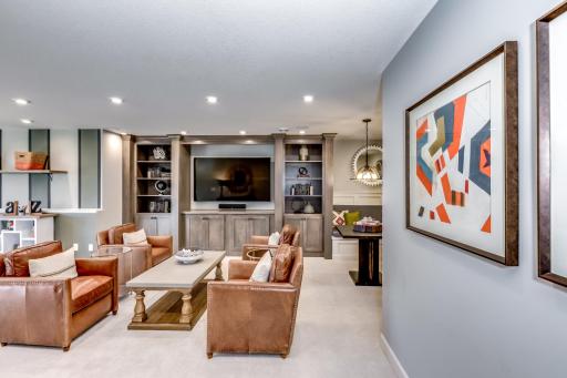 If you are typically the host for holiday get togethers? You can continue that tradition as this home features this huge lower level rec room. (model photo)