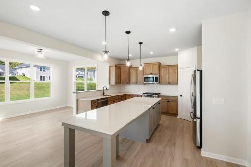 Natural light pours into the kitchen, creating a bright and inviting space!