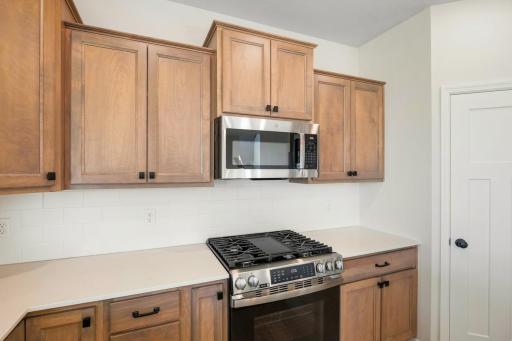The kitchen is equipped with modern appliances.