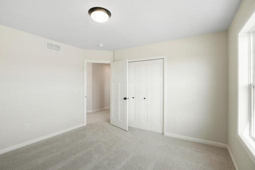 Well-sized bedroom offering flexibility for family, guests, or a home office.