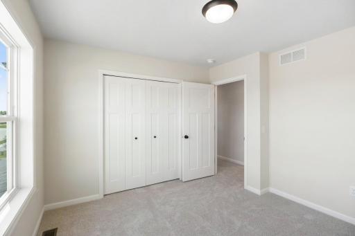 Another well-sized bedroom with closet space.