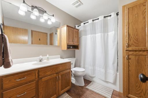 Upper level, shared, walk through bathroom.